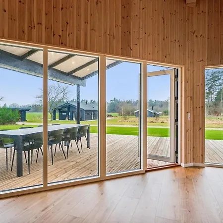 Beautiful And Modern 8-person With Spacious Terraces And Quality Interiors Located In Peaceful Fuglslev Close To Forest, Nature And *